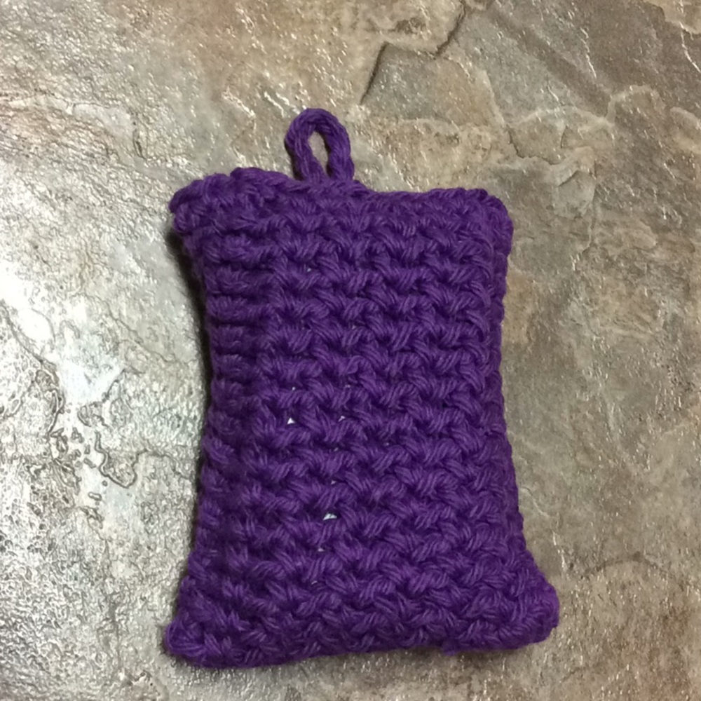Purple crocheted exfoliating soap saver bag